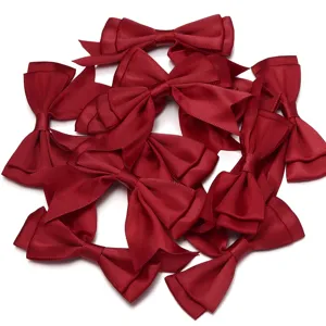 Detailed view of dark red satin double layer bow accessories for DIY crafts and gift packaging.