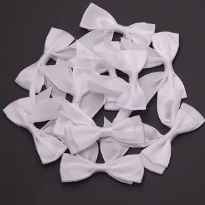 White double layer swallowtail ribbon bows detail, perfect for DIY craft and gift wrapping.