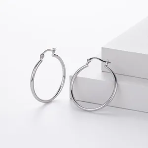S925 sterling silver hoop earrings detail view, classic smooth plain round tube jewelry.