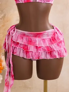 Bas de bikini à volants à motif floral rose avec détails de liens, maillot de bain.