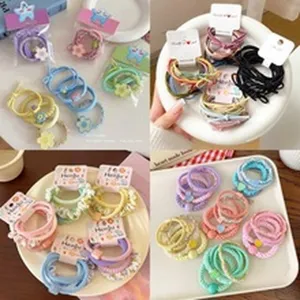 Cute floral hair ties set for women, colorful elastic bands with sweet flower charms.