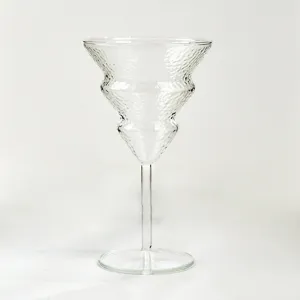 Clear glass cocktail goblet with unique tiered textured design, perfect for parties and desserts.