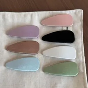 Colorful minimalist oval hair clips set, versatile snap clips for daily styling and bangs.