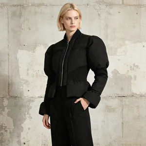 Stylish black puffer jacket featuring unique puffed sleeves and a slim fit design for women.