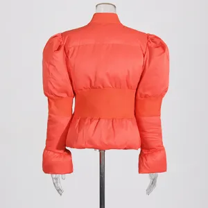 Women solid color padded jacket with stand collar, puff sleeves and fitted waist.