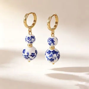 Chic Chinese style blue and white porcelain bead hoop earrings, elegant retro gold jewelry.