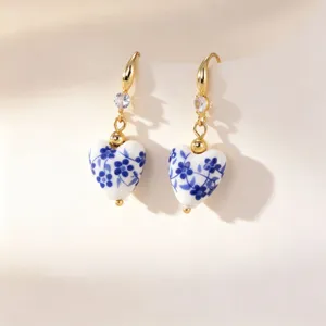 Chic blue and white porcelain heart earrings with gold plated hooks and sparkling crystal for women