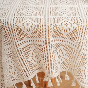 Beige crochet tablecloth with delicate lace hollow design and tassels for vintage home decor
