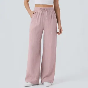 Vista dettagliata dei pantaloni larghi rosa casual da donna con coulisse in vita.