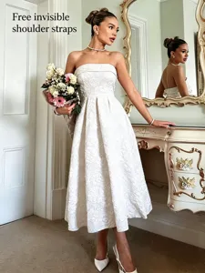 Detail view of the elegant white strapless jacquard midi dress, perfect for daily party wear.