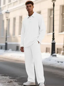 Detailed view of the men's textured knit polo long sleeve set worn outdoors in winter.