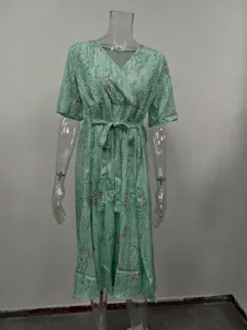 Detailed view of the casual V-neck floral printed midi dress with belt for daily wear.