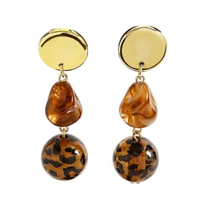 Chic leopard print drop earrings with gold disc and resin beads for women fashion styling.