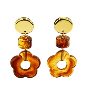 Chic brown tortoise shell flower drop earrings with gold metal studs for elegant women.
