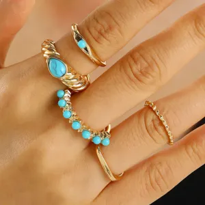 Vintage boho set apo dachtylidia me tourkouaz se chryso chroma leptomereies shot