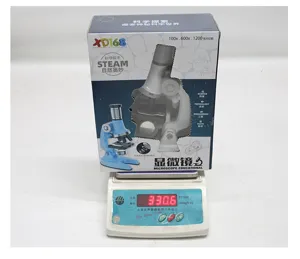 Detailed view of the 1200x science microscope toy box on a scale, perfect for kids education.