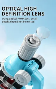 Kids science microscope toy detail view showing high definition optical PMMA lens and focus knobs.