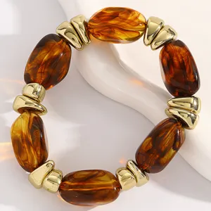 Vintage brown resin and gold CCB bead bracelet detail view, elegant retro women jewelry.