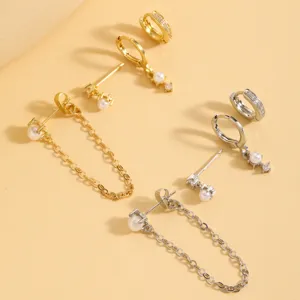 Gold and silver tone multi-piece earring set featuring sparkling zirconia and elegant pearls.
