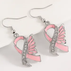 Pink ribbon wing rhinestone hook earrings fashion jewelry detailed close up view for women
