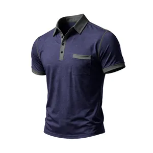 Polo manica corta uomo blu scuro con colletto a contrasto grigio e dettaglio tasca.
