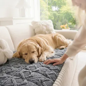 Plush pet sofa mat detail showing thick textured embossed fabric and soft cozy touch for winter.