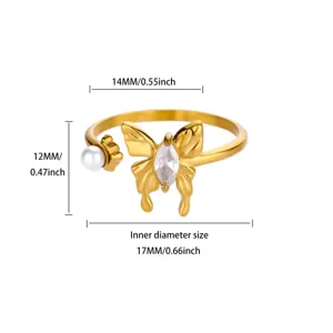 Detail view of gold stainless steel butterfly ring featuring pearl and white cubic zirconia.