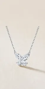 Atemberaubende 925 Silber Schmetterling Halskette mit funkelnden Moissanit Steinen als Geschenk.