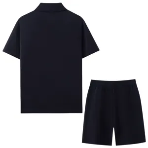 Back view details of the dark blue men's knitted polo shirt and shorts casual set.