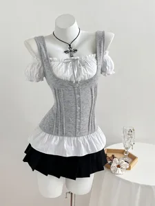 Y2K grey corset top with white off-shoulder sleeves and black pleated mini skirt set.