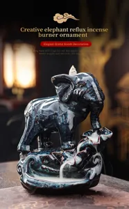 Detailed view of creative elephant backflow incense burner showing exquisite ceramic texture.