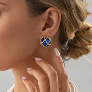 Elegante Franse retro oorbellen met blauwe steen en gouden kooi voor damesmode.