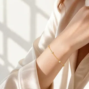 Elegant 925 sterling silver station bracelet with dainty chain and sparkling stones.