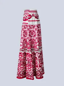Red and white majolica printed maxi skirt featuring a high waist and elegant Mediterranean design.