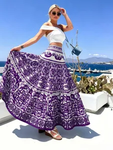 Details of the 2025 spring women's fashion print beach midi long skirt vacation style.
