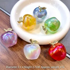Colorful crystal apple pendant detail, resin decorative ornament with gold stem.