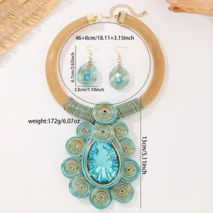 Handmade wire woven crystal statement necklace and matching teardrop earrings set view.
