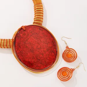 Ensemble collier et boucles d'oreilles géométriques exagérés en pierre rouge pour femmes.