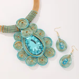 Exquisite handmade wire-wrapped crystal statement necklace and dangle earrings set.