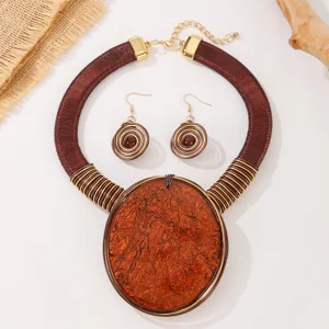 Ensemble collier statement bohème et boucles d'oreilles spirales grand pendentif ovale bijoux.