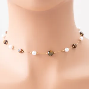 Exquisite dainty necklace featuring delicate gold chain pearl and natural stone charms.