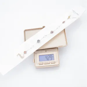 Natural stone bracelet with gold chain detail, elegant and unique design for daily wear.