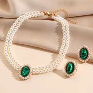 French vintage double-layer faux pearl necklace and green crystal earrings jewelry set for women.