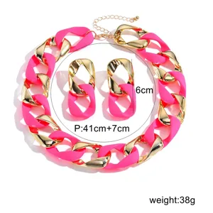 Neon pink and gold chunky chain necklace and earrings jewelry set for women fashion style.