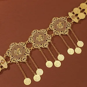 Gold alloy floral rhinestone waist chain detail, Middle Eastern belly chain close up.