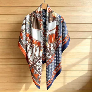 Elegant satin square scarf featuring vintage chain and baroque print, stylish shawl.