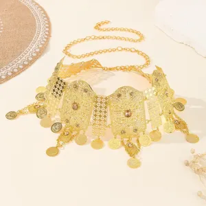 Gold alloy hollow rhinestone coin tassel waist chain for women fashion dress accessory detail.
