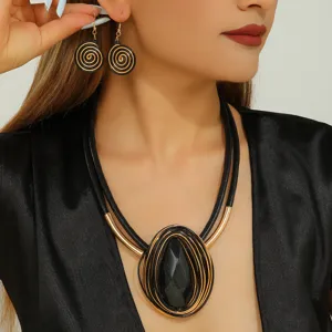 Chic leather cord teardrop rhinestone necklace and earrings jewelry set for women.
