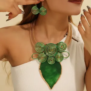 Handmade wire woven green resin leaf statement necklace and earrings jewelry set for women.