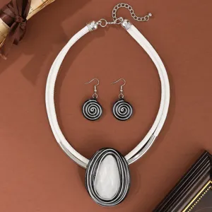 Geometric resin gemstone woven necklace and earrings jewelry set for women fashion style.